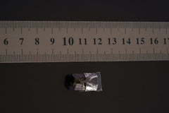 Himalayan Dravite Tourmaline Stack Pendant shown beside a ruler for scale with 2.5 mm tubular bail and oxidized silver cap.