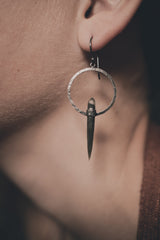 Himalayan Chlorite Phantom Quartz hoop earrings in hammered 925 sterling silver shown worn on the ear.