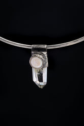 Nepal Inclusion Quartz South Sea Pearl Stack Pendant shown on black background with oxidized sterling silver cap and clear crystal body.