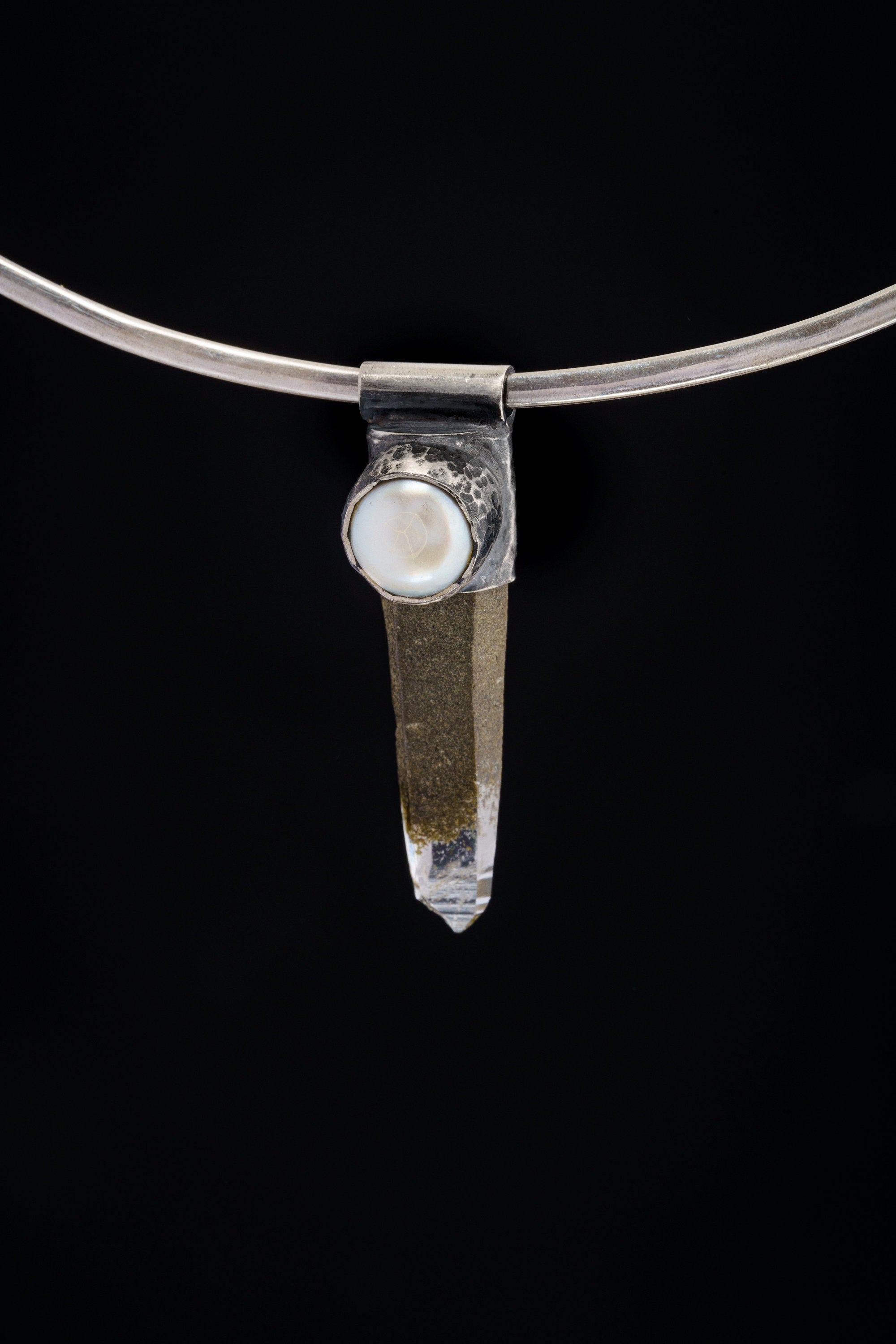 Nepal Inclusion Quartz South Sea Pearl Stack Pendant shown on black background with oxidized sterling silver cap and clear crystal point.