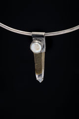 Nepal Inclusion Quartz South Sea Pearl Stack Pendant shown on black background with oxidized sterling silver cap and clear crystal point.