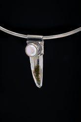 Nepal Inclusion Quartz South Sea Pearl Stack Pendant shown on black background with oxidized sterling silver cap and clear included crystal point.