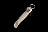 South Sea Pearl Antique Bone Spoon Pendant shown on dark background with sterling silver cap and carved bone scoop.