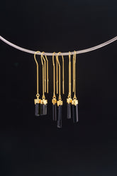 Gold-plated Tourmaline dangle earrings shown on a silver choker, with slim black crystal drops and 925 silver hooks.