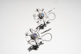 Old World Labradorite Circle Cross earrings in hammered 925 sterling silver with bezel-set stones and layered dangle design.