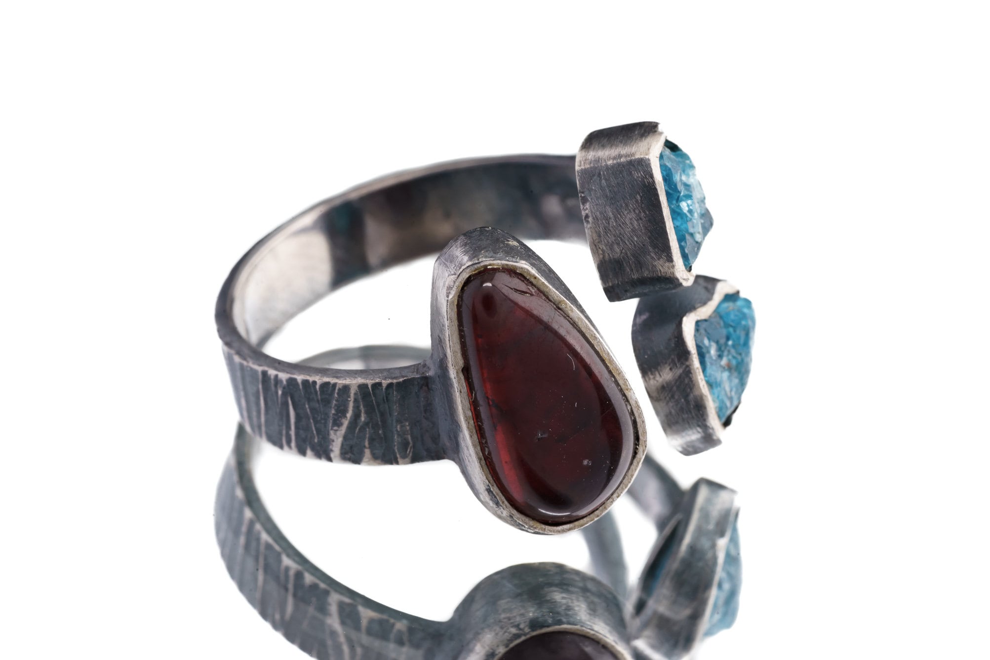 Apatite Ammolite Ammonite adjustable ring in textured 925 sterling silver with open band and multi-stone setting.