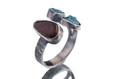 Side view of Apatite Ammolite Ammonite ring showing bezel-set stones, open-back setting, and textured silver band.