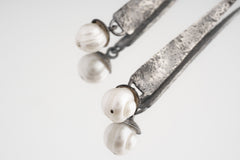 Close-up of Rustic Pearl Triangle Gumnut earring showing layered silver texture and natural Pearl centre.
