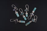 Labradorite Aquamarine dangle earrings in handmade 925 sterling silver with eye-shaped stones and blue gemstone drops.