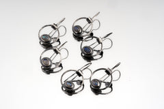 Labradorite Cat Eye earrings displayed as a matching pair with rustic sterling silver and mystical eye-shaped design.