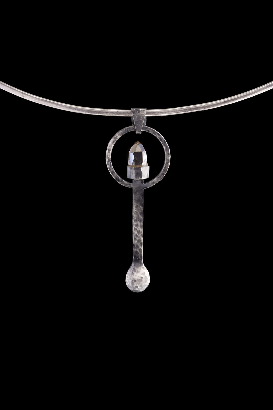 Raw Aquamarine ritual spoon displayed on a choker, showing wearable talisman styling and oxidized sterling silver form.