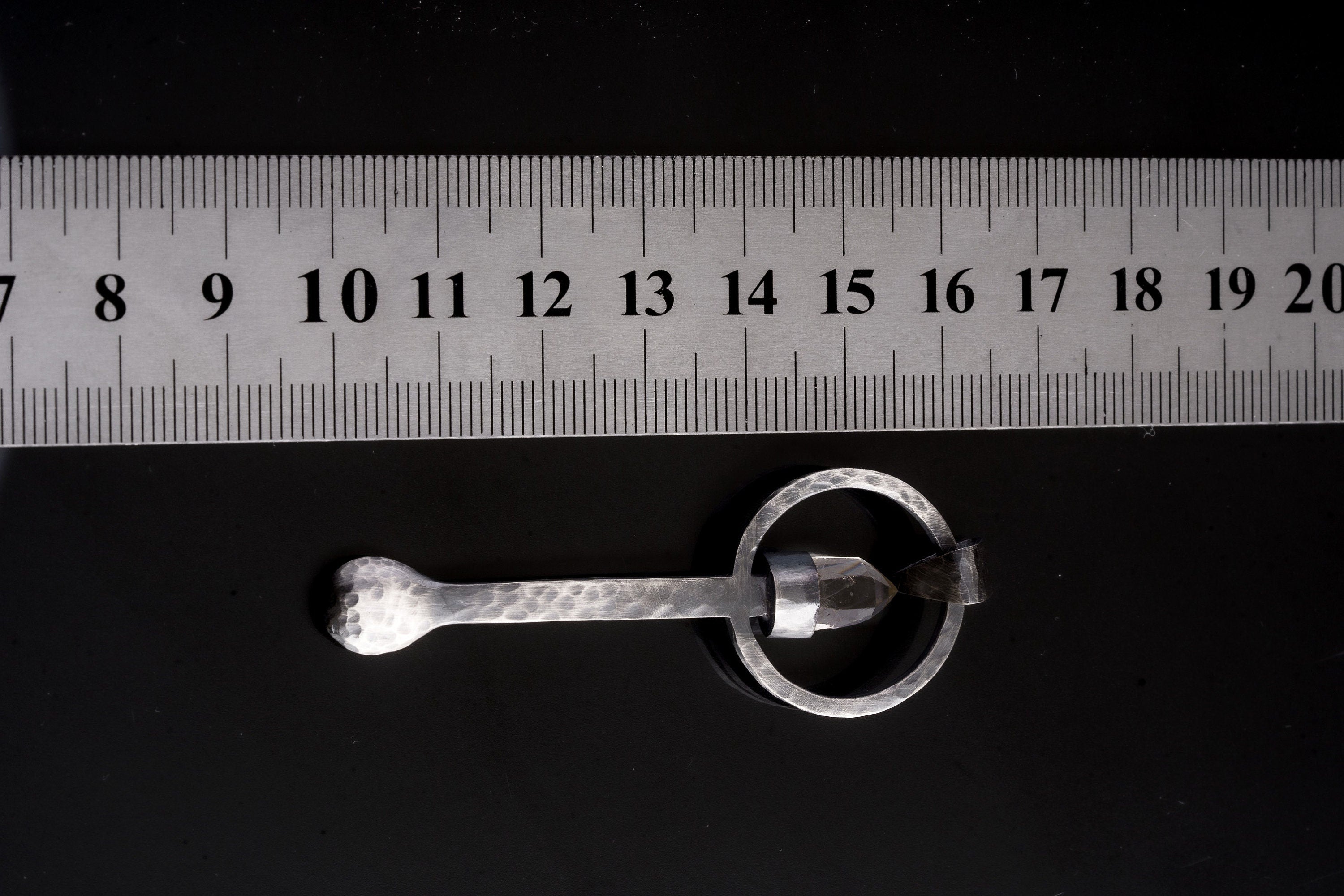 Raw Aquamarine sterling silver ritual spoon shown beside a ruler for scale with solid cast silver body.