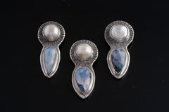Limited Venus Moonstone Pearl pendants shown as a group with South Sea Pearl and teardrop Blue Moonstone.