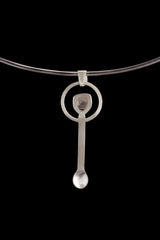 Clear Quartz silver spoon pendant displayed on a choker, showing wearable talisman styling and spoon form.