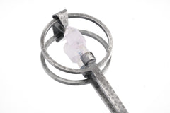 Close-up of Raw Aquamarine spoon pendant showing hammered oxidized sterling silver texture and natural crystal setting.