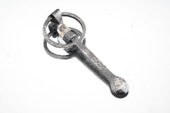 Raw Aquamarine oxidized sterling silver ritual spoon shown on white background with hammered silver and pale blue crystal.