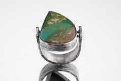 Front view of Chrysoprase ring showing fresh green stone, oxidized sterling silver, and abstract textured setting.