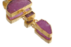 Multi-stone Rubellite, Pink Tourmaline, Black Opal, and Ruby pendant shown beside a ruler, measuring approximately 5 to 5.5 cm long.