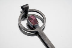 Pink Tourmaline spoon pendant shown on white background with solid 925 sterling silver and rose-toned gemstone setting.