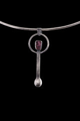 Pink Tourmaline silver spoon pendant displayed on a choker, showing wearable talisman styling and spoon form.