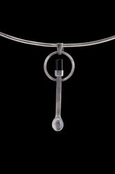Black Tourmaline sterling silver spoon pendant shown on a choker with hammered silver and dark stone setting.