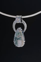 Blue Moonstone Moss Agate heirloom pendant displayed on choker with oxidized sterling silver brutalist setting.