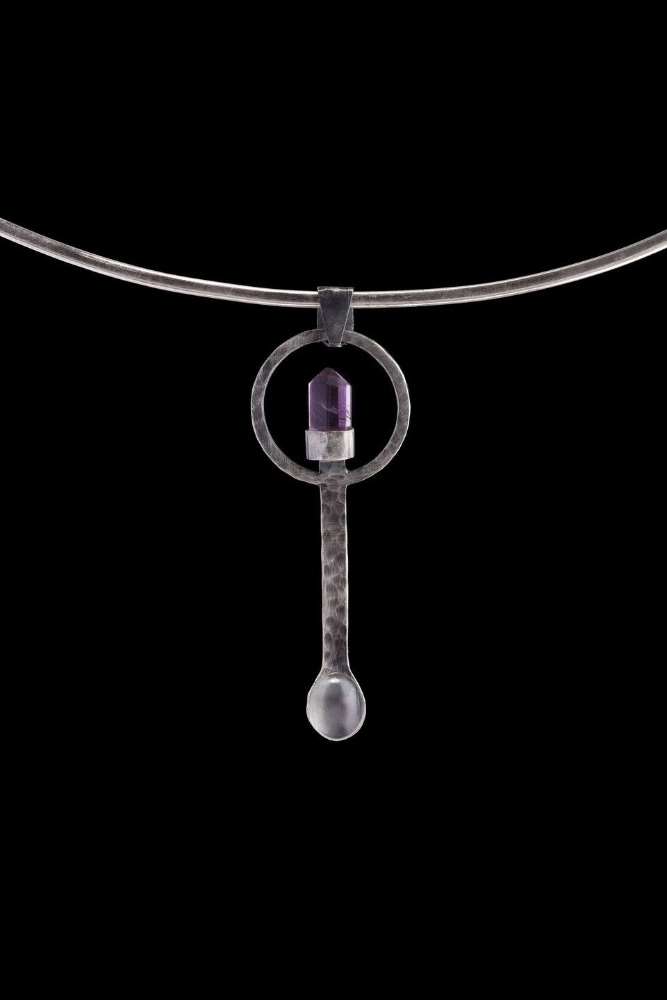 Amethyst Generator silver ritual spoon displayed on a choker, showing wearable talisman styling and spoon form.