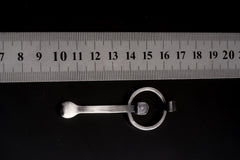 Himalayan Laser Quartz sterling silver spoon pendant shown beside a ruler for scale with solid cast silver body.