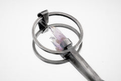 Close-up of Vera Cruz Amethyst spoon pendant showing brush-textured silver and delicate double terminated crystal setting.