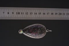 Oxidized Sterling Silver Pendant: Balsa Ruby, Ethiopian Opal Sun Ray Design