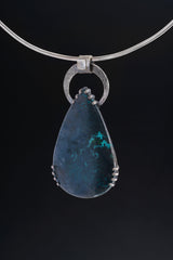 Raw Moonstone Chrysocolla Heirloom Pendant shown on black background with large bail and oxidized silver setting.