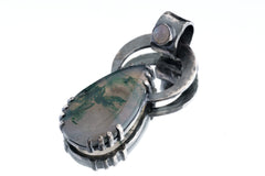 Blue Moonstone Moss Agate pendant shown on white background with teardrop stone and large silver bail.