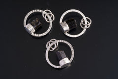 Limited collection Himalayan Tourmaline halo pendants in high-shine sterling silver.