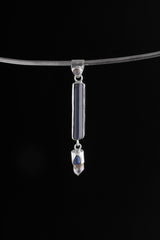 Four-stone sterling silver pendant displayed on choker with Moonstone, Tourmaline, Smoky Quartz, and Sapphire.