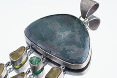 Close view of Australian Malachite with Pyrite inclusions in oxidized sterling silver pendant.