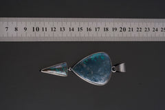 Malachite Pyrite Chrysocolla Azurite pendant shown beside a ruler for scale as a large sterling silver statement piece.