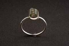 Watermelon Tourmaline sterling silver stack ring shown on a dark background, with colour-zoned crystal and fine silver band.