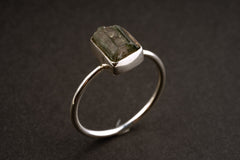 Watermelon Tourmaline sterling silver stack ring shown on a dark background, with colour-zoned crystal and fine silver band.