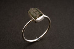 Watermelon Tourmaline sterling silver stack ring shown on a dark background, with colour-zoned crystal and fine silver band.