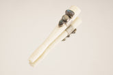 Labradorite Antique Bone Tube Pendant shown on a light background with textured sterling silver band and three stones.