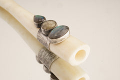 Labradorite antique bone pendant shown from the side, highlighting hollow tube form and handmade sterling silverwork.