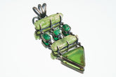 Green Kyanite Emerald Chrysoprase pendant on a white background, with oxidized sterling silver and layered green gemstones.