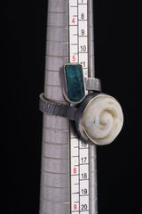 Land and Sea Apatite Shell ring shown beside a ruler for scale, with adjustable sterling silver open band.