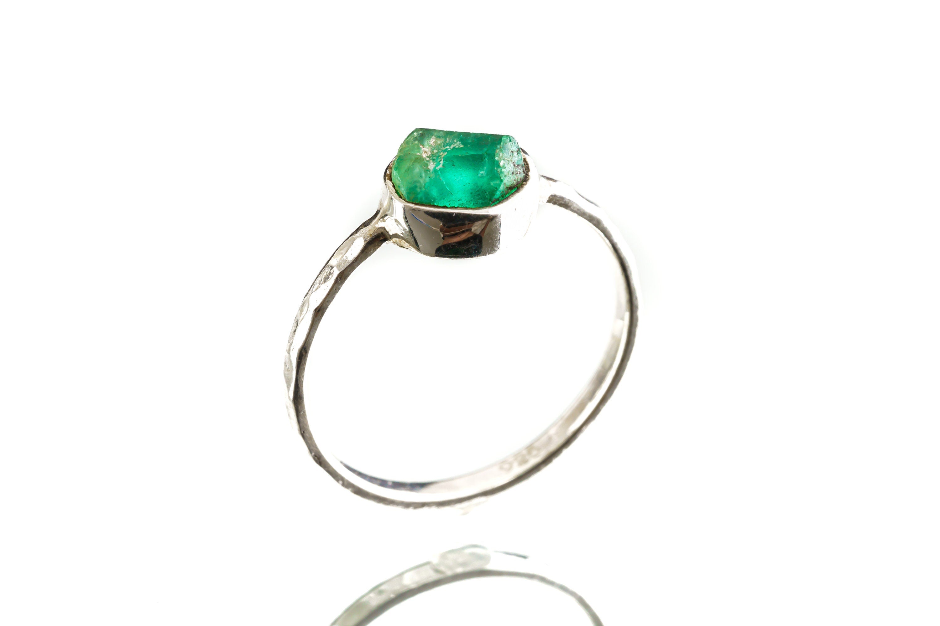 Front view of Australian Raw Emerald ring showing natural green beryl colour and handmade sterling silver setting.