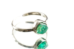 Australian Raw Emerald sterling silver stack ring shown on a light background, with green gemstone and hammered band.