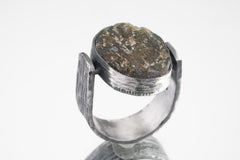Side view of Labradorite ring showing bark-like oxidized silver texture, coiled tendrils, and raised circular stone.