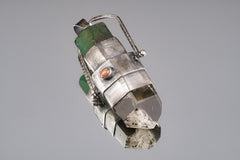 Large Australian Emerald Phantom Chlorite Quartz spinner pendant shown on a white background with oxidized sterling silver setting.