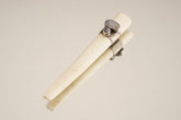 Blue Moonstone Antique Bone Tube Pendant shown on a light background with polished sterling silver band and two stones.