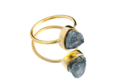Gold-plated Blue Tourmaline Indicolite ring shown on a light background, with deep teal gemstone and stacking band.