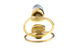 Gold-plated Blue Tourmaline Indicolite ring shown on a light background, with deep teal gemstone and stacking band.
